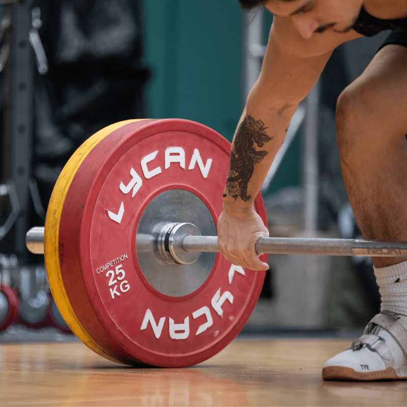 weightlifting plates and barbell