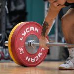 weightlifting plates and barbell