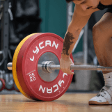 weightlifting plates and barbell