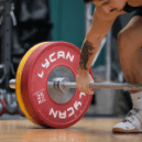 weightlifting plates and barbell